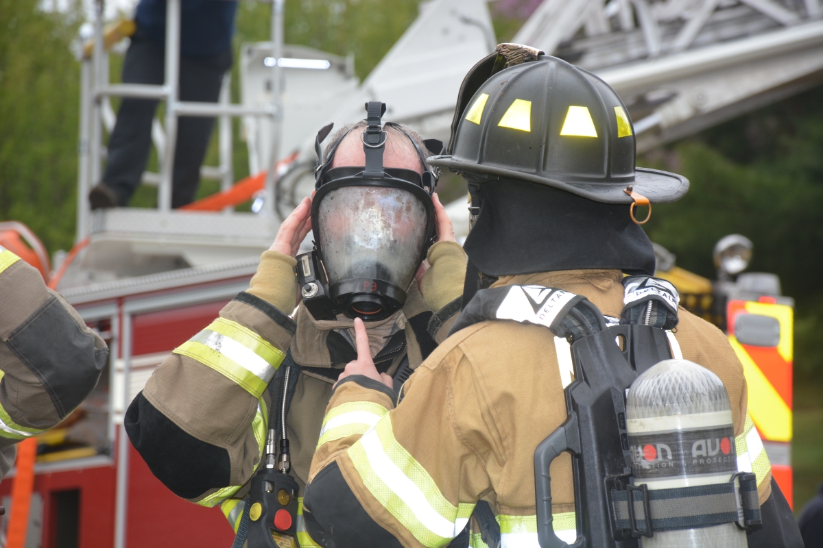 Firemen prepare gear before training