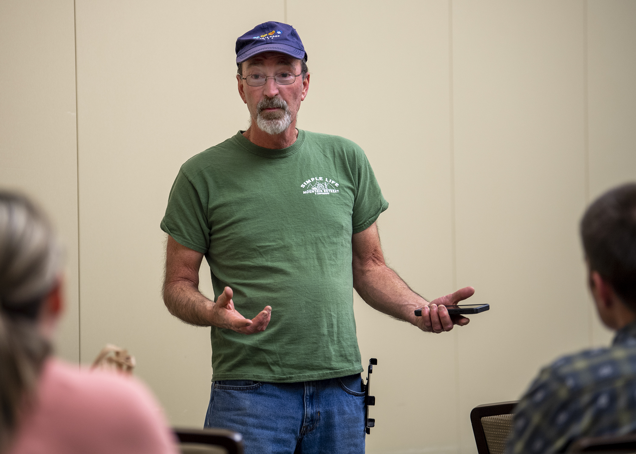Man speaks indoors to a group of Appalachian Farm School participants