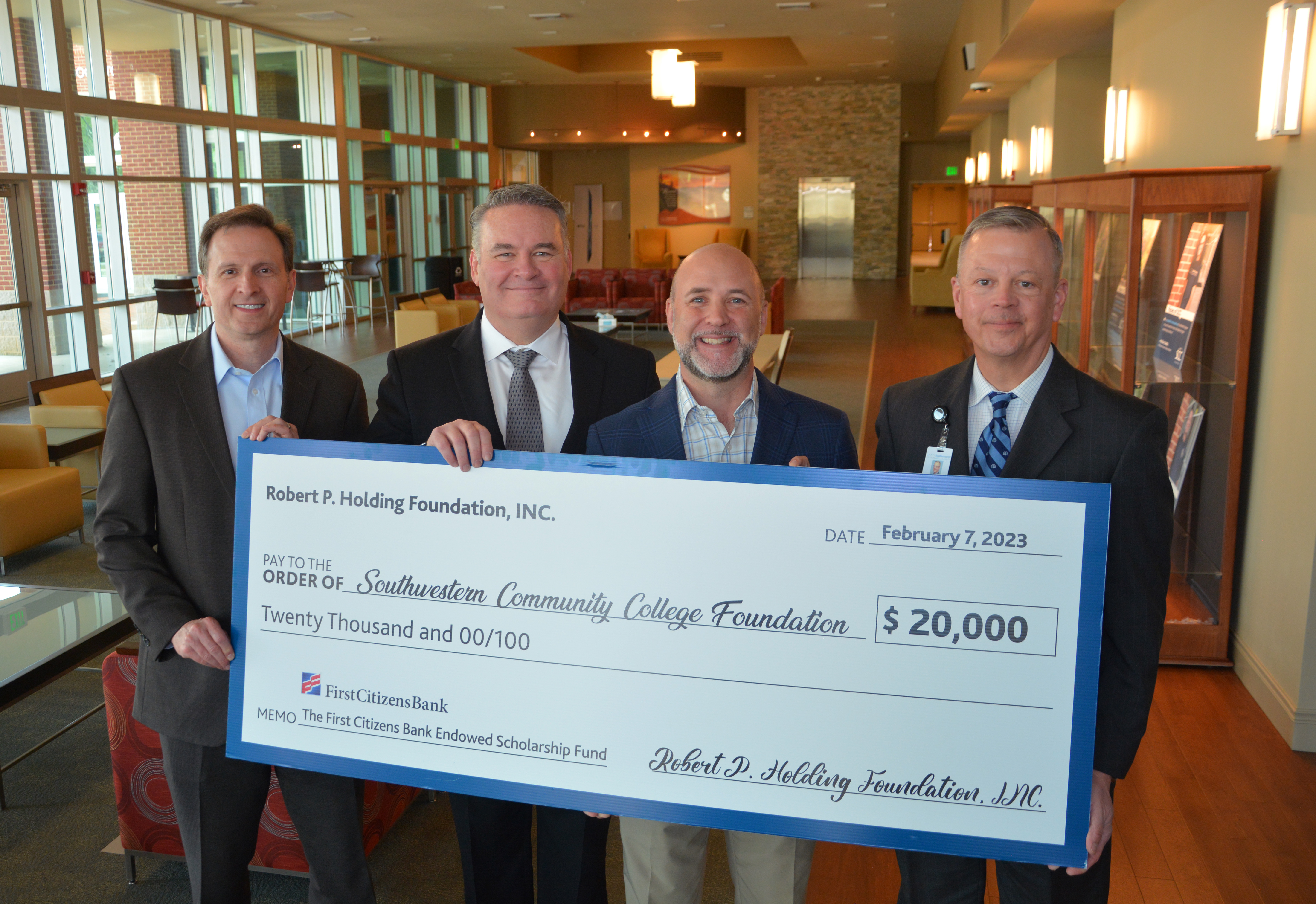 First Citizens Bank representatives on behalf of the Robert P. Holding Foundation recently presented a $20,000 check to the SCC Foundation for student scholarships. Pictured here are, from left: Neil Chapman, First Citizens Bank Senior Portfolio Strategist; Scott Connor, First Citizens Bank Senior Vice President; Darren Morton, Institutional Consultant for First Citizens Bank Institutional Wealth; and Brett Woods, Director of the SCC Foundation.