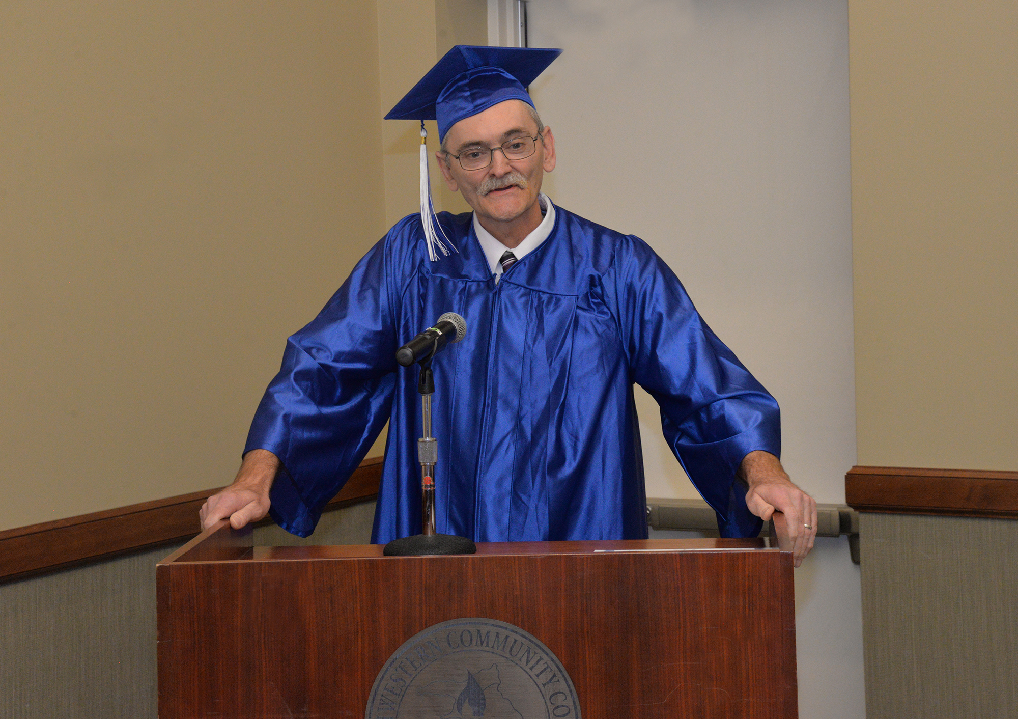 George DeWitt address the crowd during SCC’s High School Equivalency graduation ceremony on Jan. 11 in Sylva.