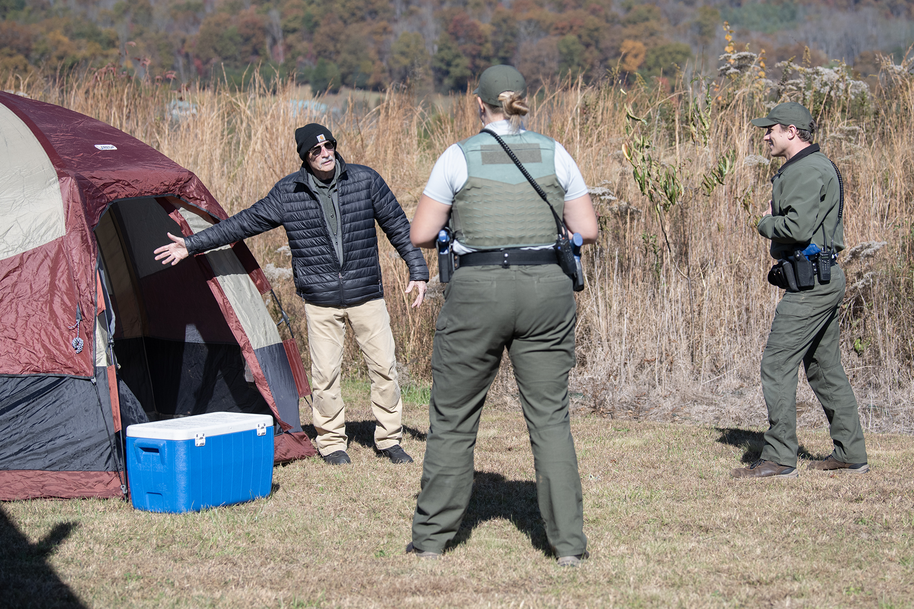 Role player engages with National Park Service recruits