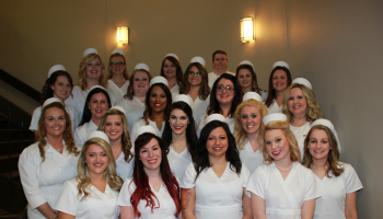 SCC nursing students take picture before pinning ceremony.