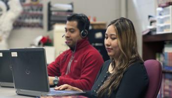 Two students study during a CCR class