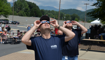 SCC employees observe the 2017 solar eclipse through solar glasses