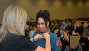 Student receives pin