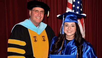 Jackson County graduate Sarah Jennings (right) with Dr. Don Tomas.