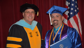 SCC president Dr. Don Tomas and SCC graduate Jesse Moore pictured at graduation in May 2017.