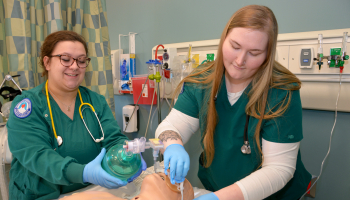 Kristin Farmer (right), a 2022 SCC Respiratory Therapy graduate from Canton, and her former classmate, Kendra Hall of Cullowhee, are shown here in one of Southwestern’s simulation labs. Southwestern is partnering with Blue Ridge Community College to offer Respiratory Therapy in Transylvania County.