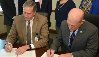 MHU President Dr. Tony Floyd and SCC President Dr. Don Tomas signed an agreement, creating the Mountain Lion-Southwestern Promise during an event at SCC’s campus in Sylva.