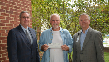 Mike Wade (center) of Cullowhee recently established a new endowed fund with the Southwestern Community College Foundation. When complete, it will be the largest endowed scholarship fund by a single individual in SCC history. Pictured with Wade are Dr. Don Tomas (left), SCC President, and Brett Woods, Director of the SCC Foundation.
