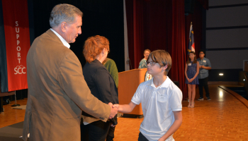 New group of seventh-graders inducted into the New Century Scholars program.