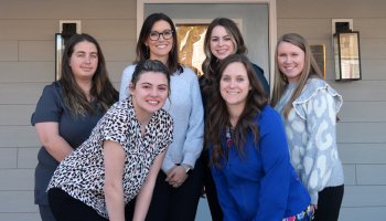 SCC Human Services Technology graduate Ashley Cook (back row, left) and second-year SCC Nursing student Elizabeth Cartwright (front left) are both employed by AWAKE Children’s Advocacy Center in Sylva. Also pictured are AWAKE employees, from left behind Cartwright: Crystal Jones, Executive Director; Maggie Grey, Forensic Interviewer/Case Manager; Paige Gilliland, Senior Forensic Interviewer; and Kristen Brady, Administrative Assistant.