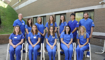Radiography students pose for picture outside.