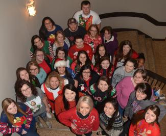 Group of people stand on stairs