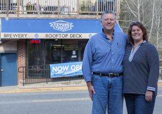 Photo of a couple standing outside a bar in Bryson City.