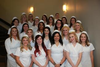SCC nursing students take picture before pinning ceremony.