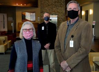 Joyce Lantz is pictured with Dr. Don Tomas and Brett Woods