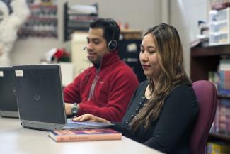 Two students study during a CCR class