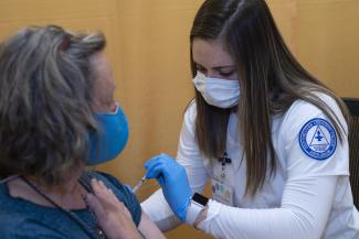 SCC Nursing student Corrie Kinsland served at WCU’s COVID-19 vaccination clinic on March 15 in Cullowhee.