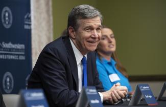 Gov. Cooper smiles