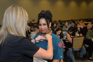 Student receives pin