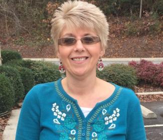 Woman smiles for picture