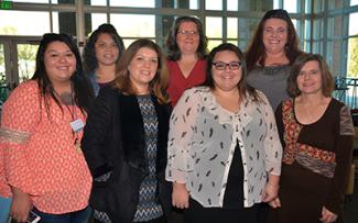 SCC medical assisting graduates pose for picture at pinning ceremony on Dec. 13.