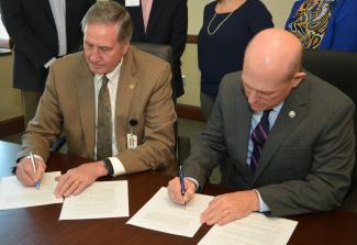 MHU President Dr. Tony Floyd and SCC President Dr. Don Tomas signed an agreement, creating the Mountain Lion-Southwestern Promise during an event at SCC’s campus in Sylva.