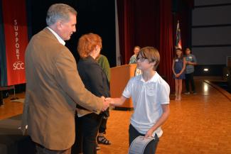 New group of seventh-graders inducted into the New Century Scholars program.