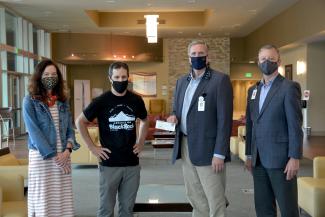 Three men and a woman