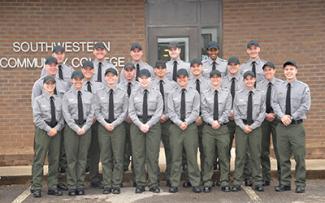 NPS-SLET graduates pose for picture before graduation ceremony.