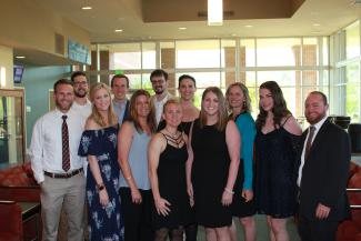 SCC physical therapist graduates pose for picture before their pinning ceremony