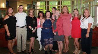 SCC respiratory therapy students pose for group picture before their pinning ceremony.