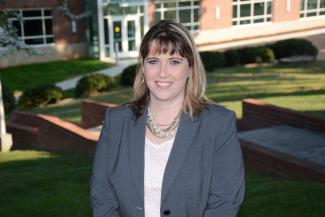 Woman poses outdoors on SCC's Jackson Campus