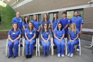 Radiography students pose for picture outside.